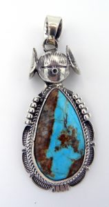 Navajo turquoise and sterling silver maiden pendant by Bennie Ration
