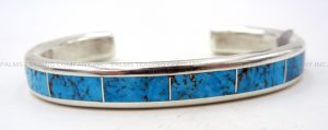 Navajo turquoise and sterling silver channel inlay cuff bracelet by Larry Loretto