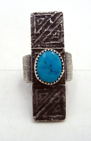 Navajo tufa cast sterling silver and turquoise ring