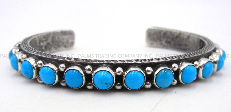 Navajo turquoise and sterling silver row cuff bracelet