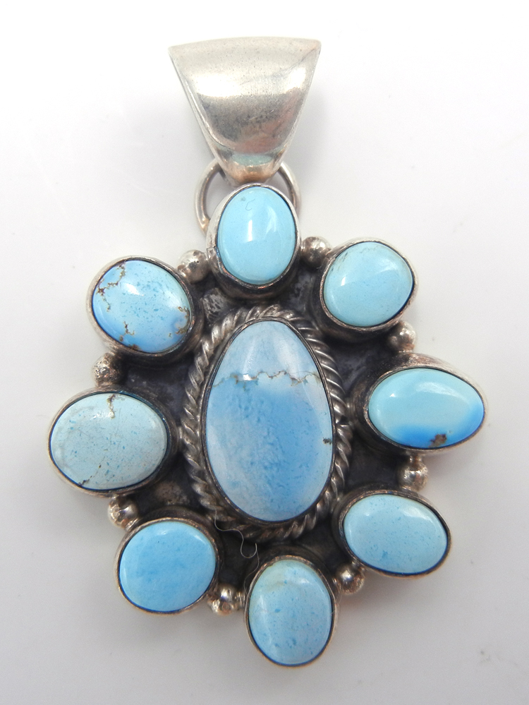 Navajo Golden HIll turquoise and sterling silver cluster pendant