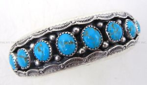 Navajo turquiose and sterling silver shadowbox style row cuff bracelet by Wilbert Muskett