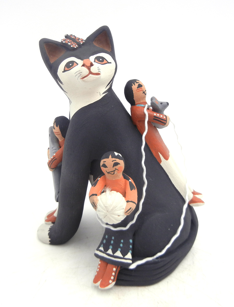 Jemez black cat storyteller with three children by Carol Lucero Gachupin