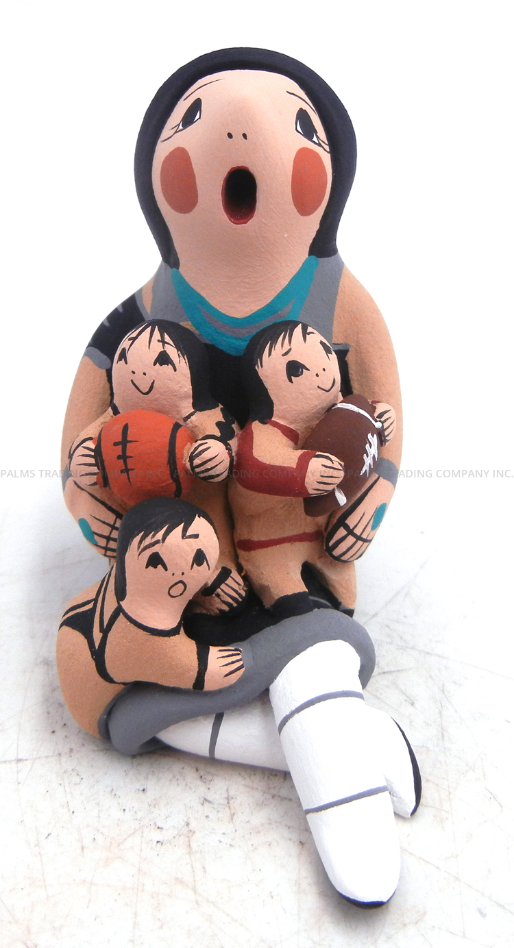 Jemez seated storyteller with three children by Diane Lucero