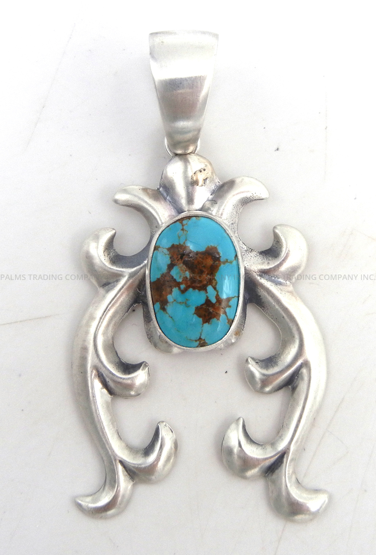 Navajo sandcast sterling silver and turquoise naja pendant