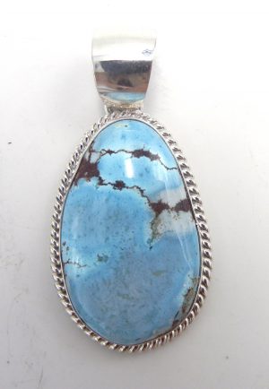 Navajo Golden Hills turquoise and sterling silver pendant
