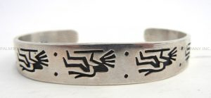 Hopi sterling silver overlay kokopelli cuff bracelet by Cyrus Josytewa