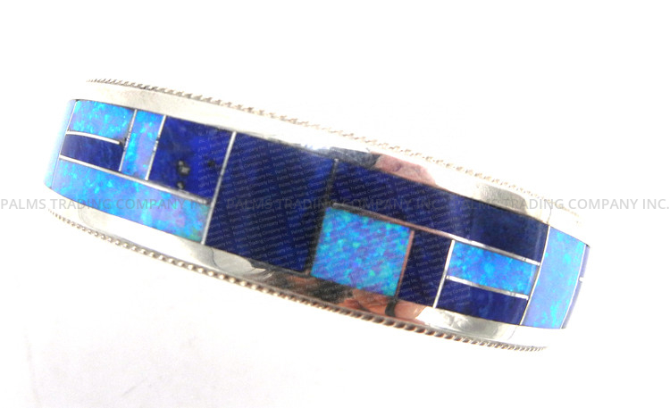 Zuni lapis, lab opal, and sterling silver inlay cuff bracelet by Rickel and Glendora Booqua