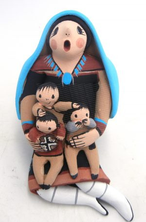 Jemez seated storyteller with three children by Joyce Lucero