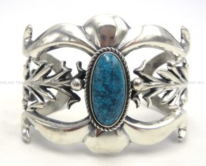 Navajo sandcast sterling silver and Kingman turquoise corn stalk cuff bracelet by Eugene Mitchell