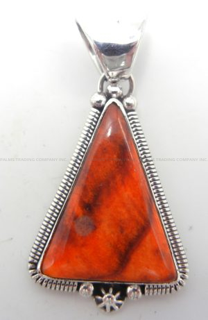 Navajo triangular orange spiny oyster shell and sterling silver pendant by Rydell Billie