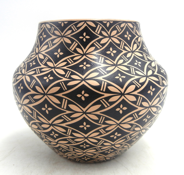 Jemez handmade and hand painted buff and black polished jar by Phyllis Tosa