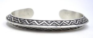 Navajo hand stamped sterling silver triangle cuff bracelet by Randy Secatero