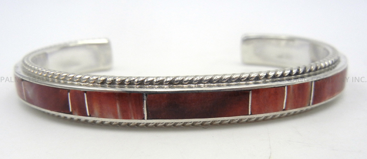Zuni red spiny oyster shell and sterling silver channel inlay cuff bracelet by Ricky Booqua