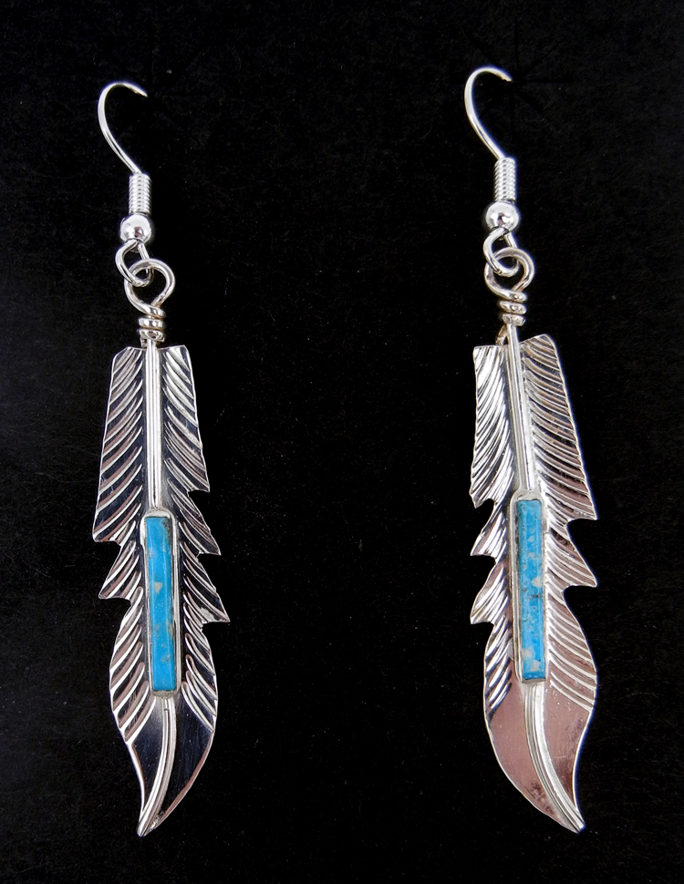 Navajo turquoise inlay and sterling silver feather dangle earrings by Fred Barney