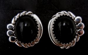 Navajo small onyx and sterling silver post earrings by Delores Cucman