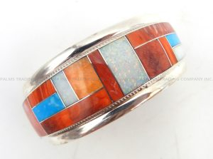 Zuni multi-stone inlay and sterling silver channel inlay cuff bracelet by Rickel and Glendora Booqua