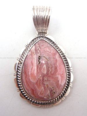 Navajo tear drop shaped rhodochrosite and stering silver pendant