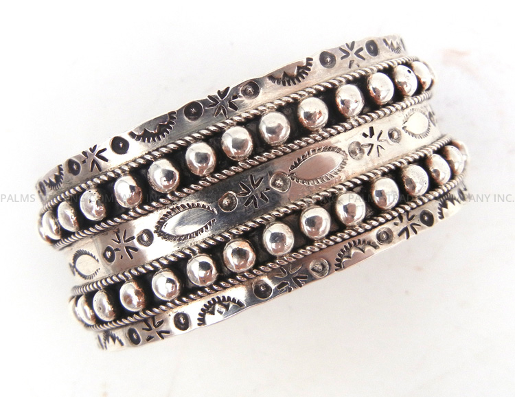 Navajo sterling silver stamped and applique cuff bracelet by Pearl Ukenstine