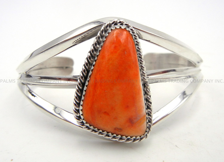 Navajo orange spiny oyster shell and sterling silver cuff bracelet by Elroy Chavez