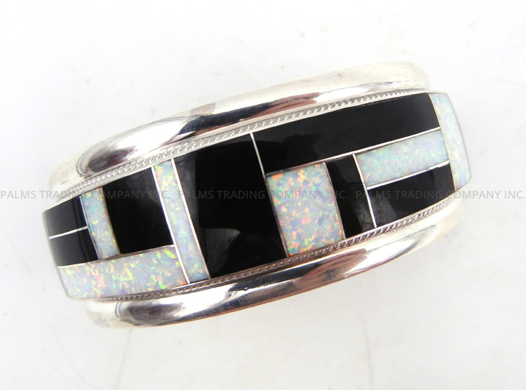 Zuni jet, white lab opal and sterling silver channel inlay cuff bracelet by Rickel and Glendora Booqua