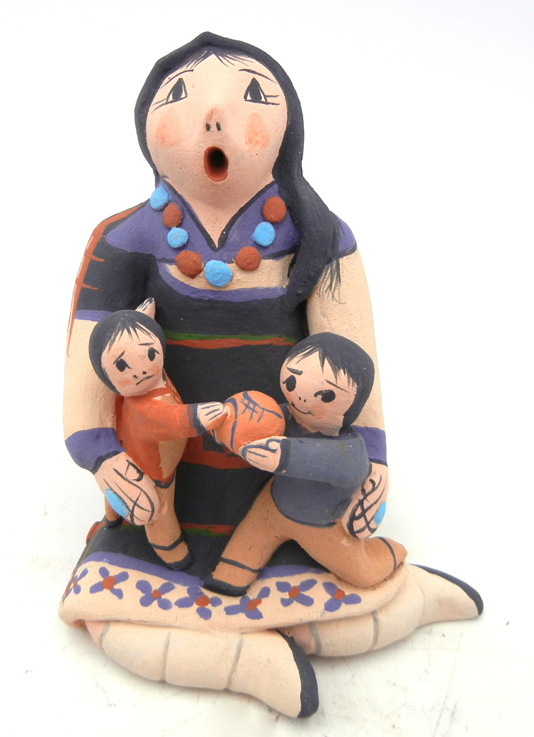 Jemez small seated storyteller figurine with two children and ball by Mary Lucero
