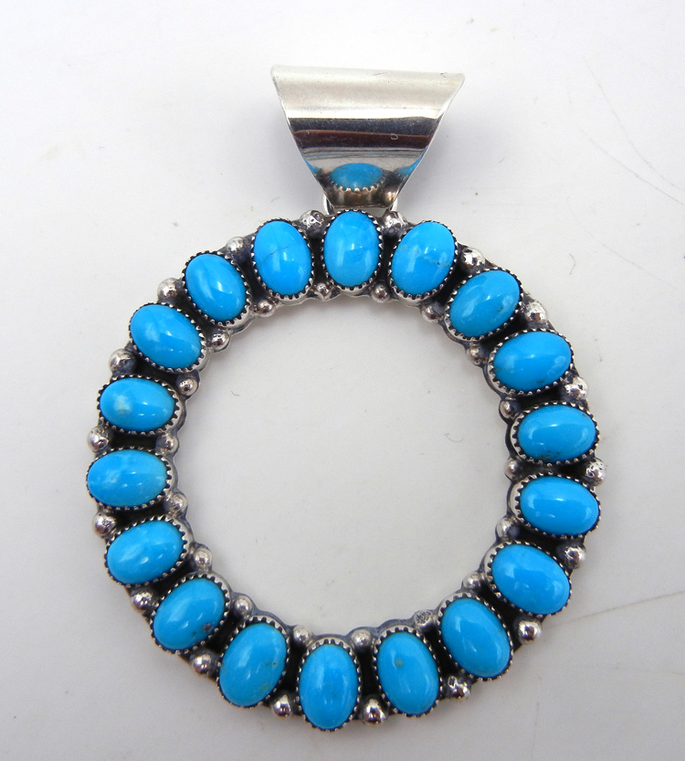 Zuni turquoise and sterling silver cut out circle pendant
