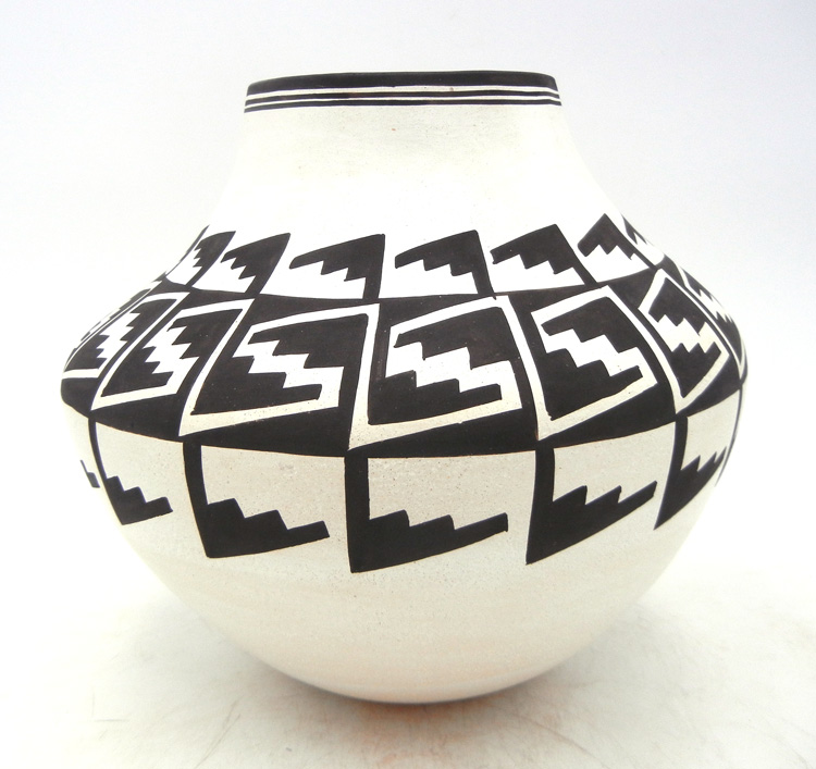 Laguna handmade and hand painted black and white step and water pattern jar by Myron Sarracino