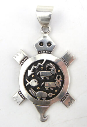 Santo Domingo sterling silver overlay turtle pendant with 14k gold moons by Joseph Coriz