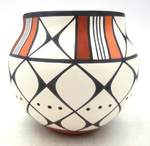 Acoma handmade and hand painted small polychrome butterfly design jar by David Antonio