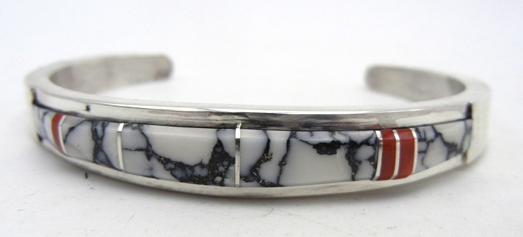 Navajo white buffalo, coral and sterling silver channel inlay cuff bracelet by Kyle Yellowhair