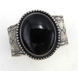 Navajo wide band brushed sterling silver onyx cuff by Juan Guerro