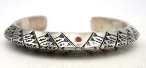 Navajo heavy gauge sterling silver triangle cuff bracelet with turquoise and coral accents by Randy Secatero