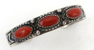 Navajo coral and brushed and stamped sterling silver cuff bracelet