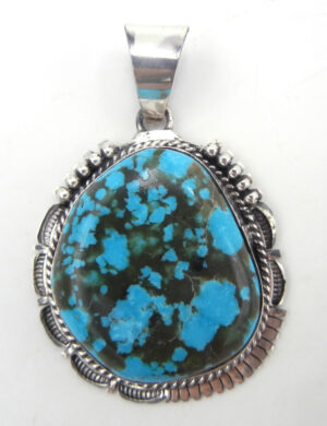 Navajo large turquoise and sterling silver pendant by Dakota Ration