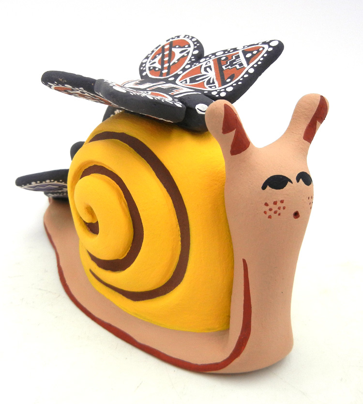 Jemez handmade and hand painted snail figurine with two butterflies by Sharela Waquie