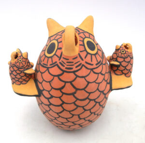 Zuni handmade and hand painted owl figurine with two owlets