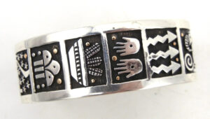 Santo Domingo sterling silver and 14k gold overlay cuff bracelet by Joseph Coriz