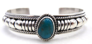 Navajo domed sterling silver and turquoise cuff bracelet by Thomas Charley