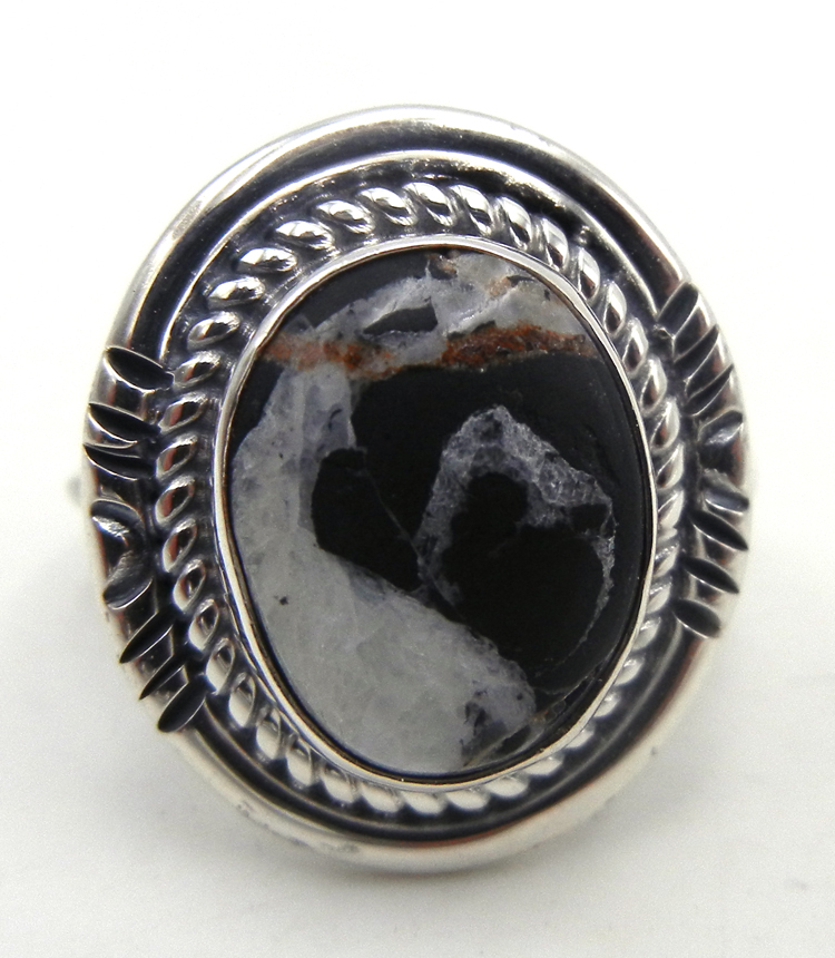 Navajo white buffalo and sterling silver ring with sterling silver rope pattern shank