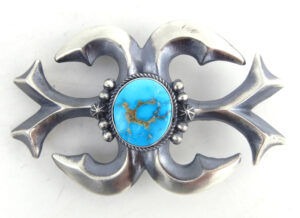 Navajo sandcast sterling silver and turquoise belt buckle by Harrison Bitsue