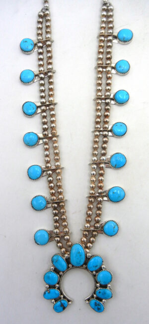 Navajo turquoise and sterling silver contemporary squash blossom necklace