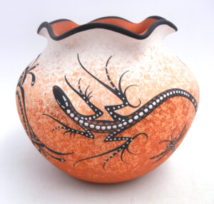 Zuni handmade and hand painted three dimensional lizard jar with scalloped rim by Deldrick Cellicion