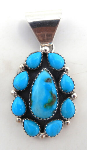 Navajo Kingman turquoise and sterling silver small cluster pendant by Julia Etsitty