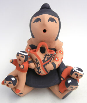 Jemez seated handmade and hand painted storyteller figurine with four children by Vernida Toya