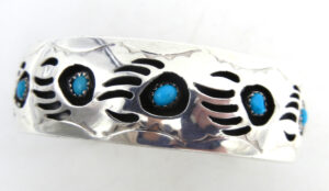 Navajo sterling silver and turquoise shadowbox bear paw cuff bracelet by Pearlene Spencer.