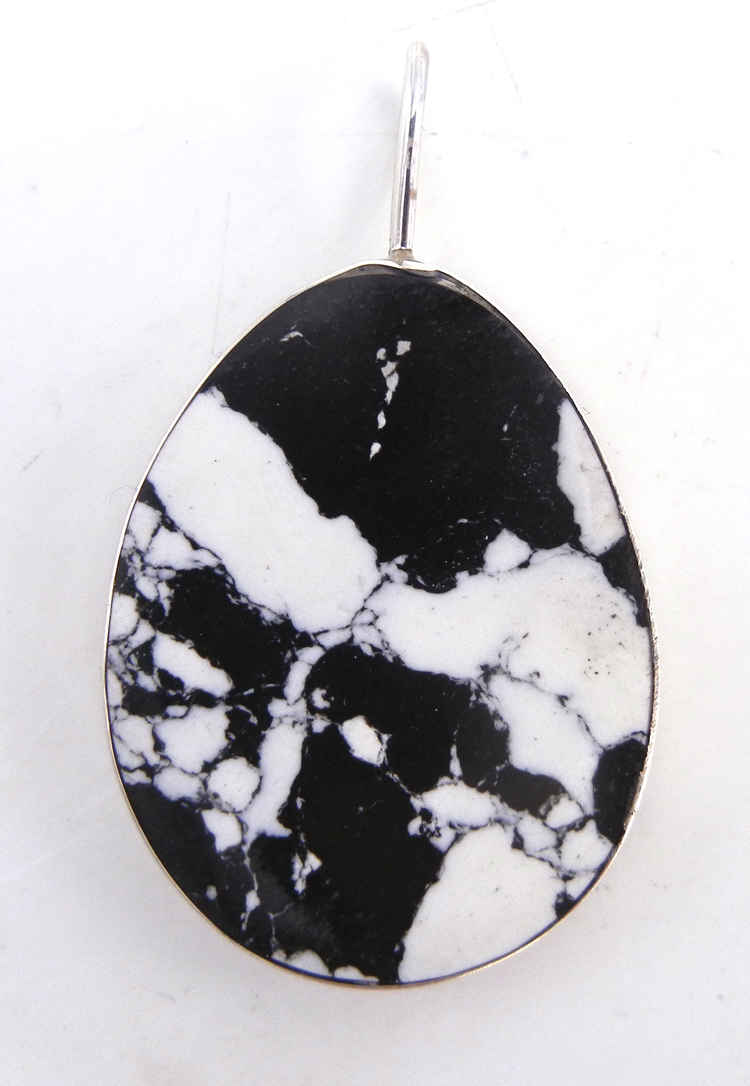 Santo Domingo White Buffalo and sterling silver pendant by Ronald Chavez