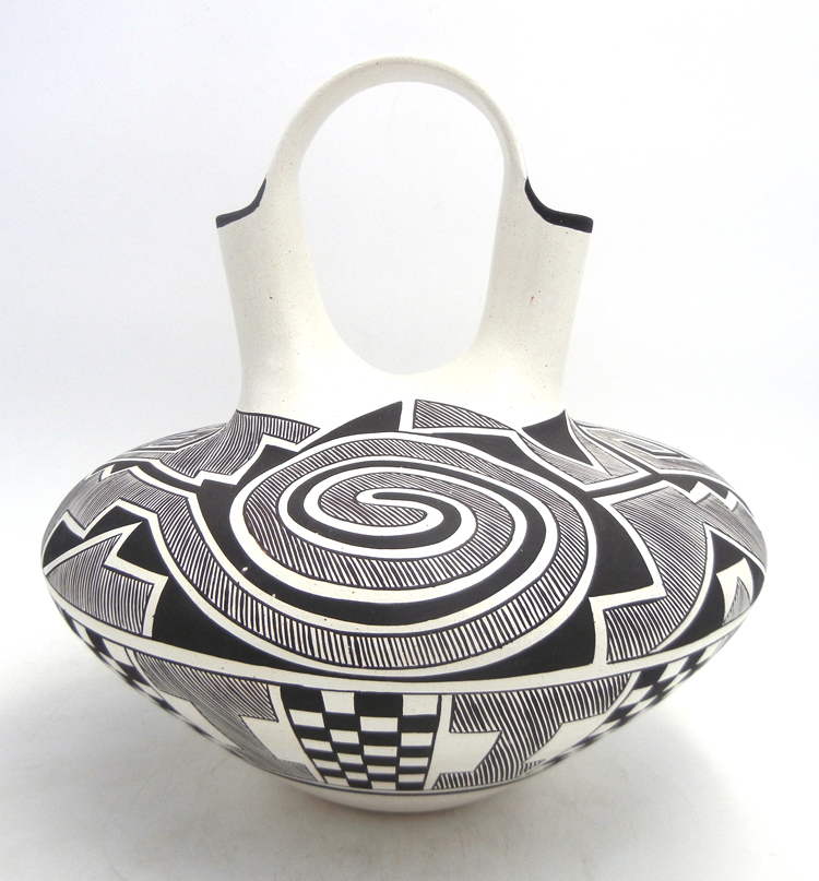 Navajo handmade and hand painted black and white tularosa and fine line design wedding vase by Myron Sarracino