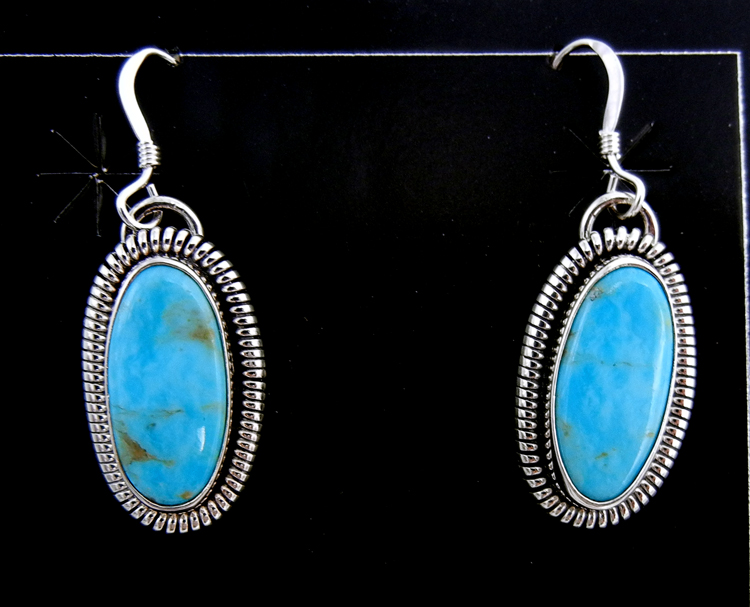 Navajo turquoise and sterling silver oval dangle earrings by Wydell Billie