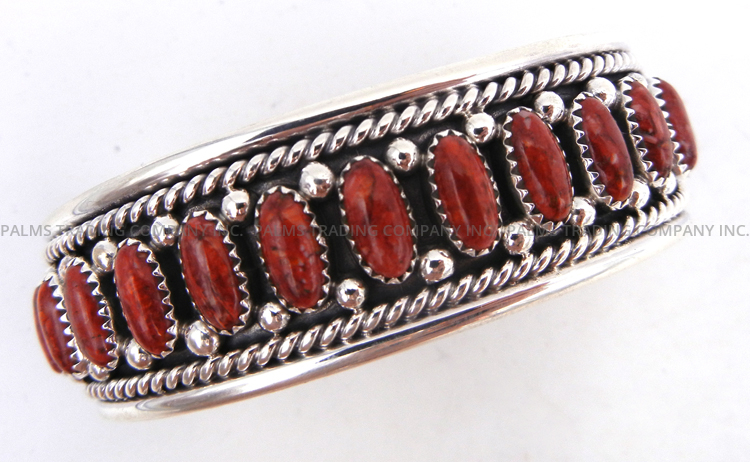Navajo red spiny oyster shell and sterling silver row cuff bracelet by Chester Charley